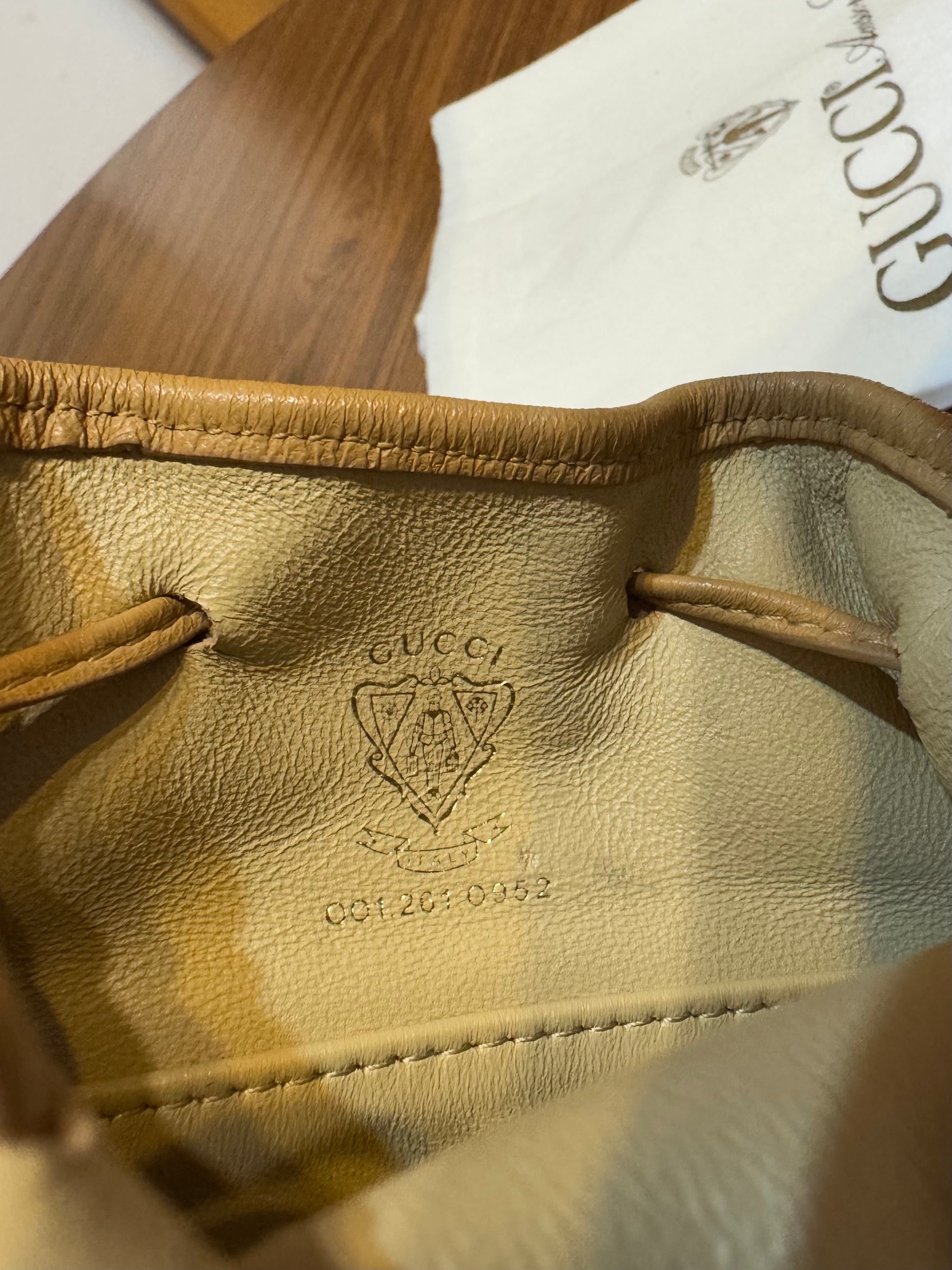 Gucci monogram mini drawstring