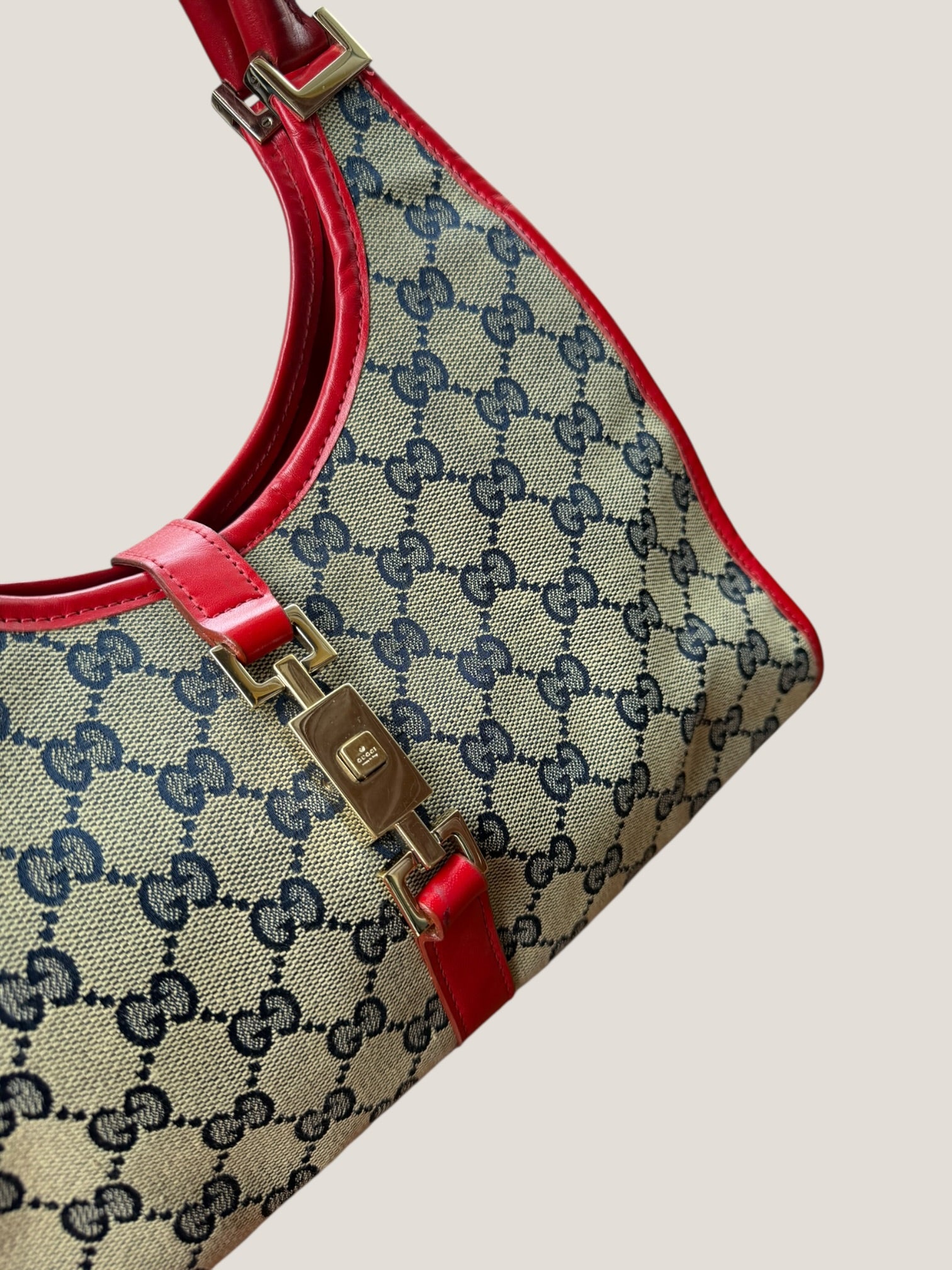 Gucci Jackie con profili rossi