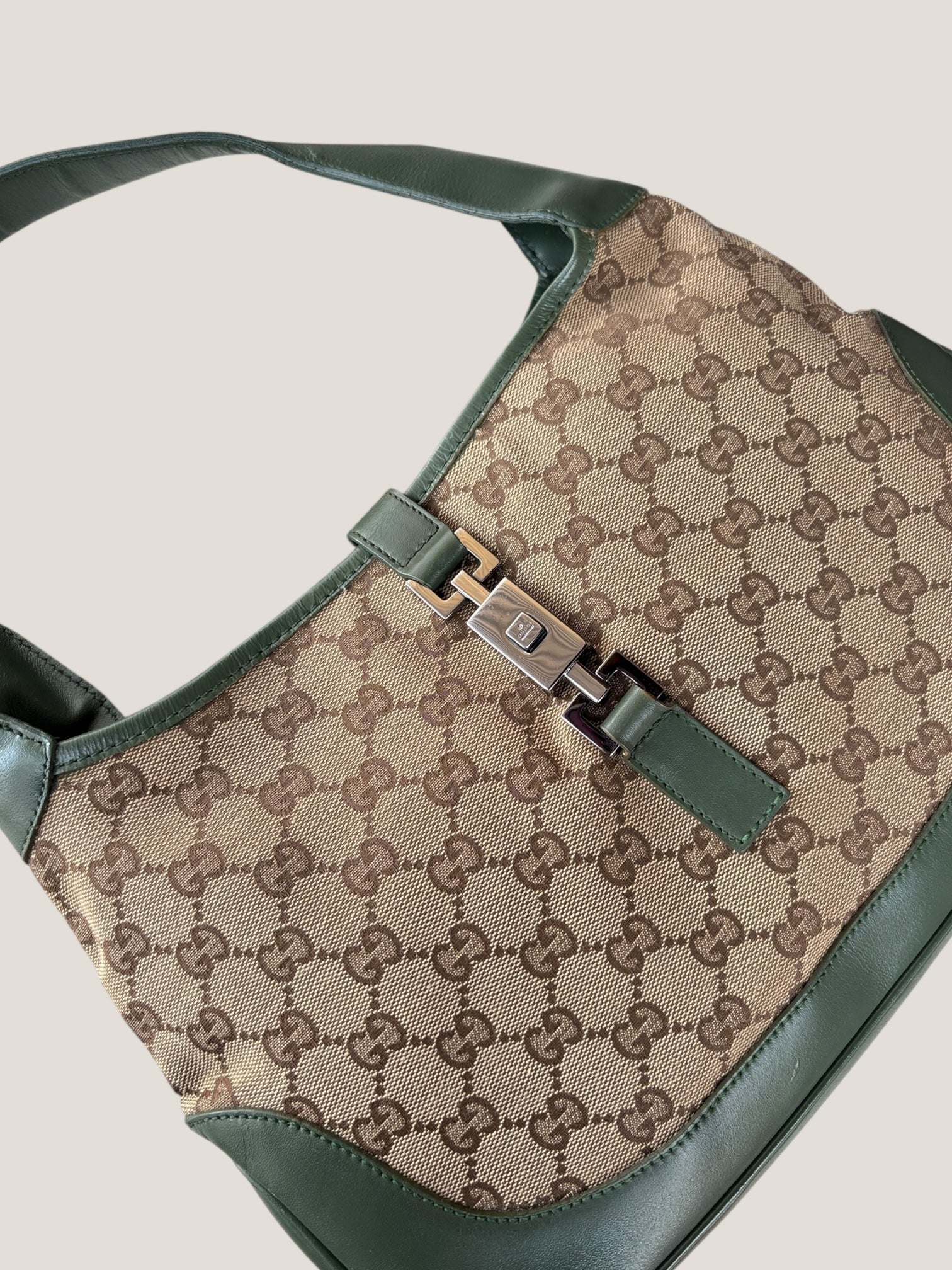 Gucci Jackie GG canvas con profili in pelle verde