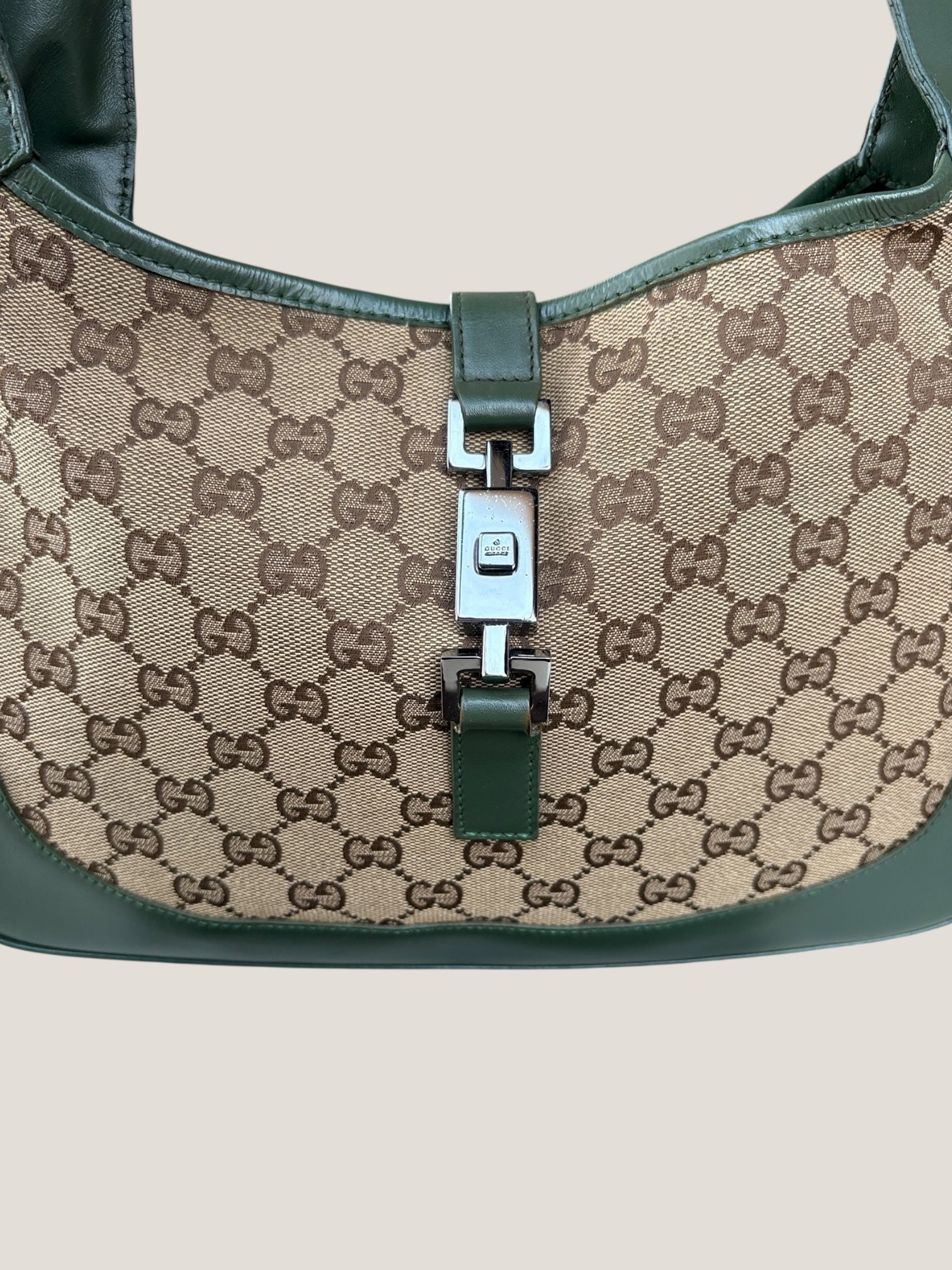 Gucci Jackie GG canvas con profili in pelle verde