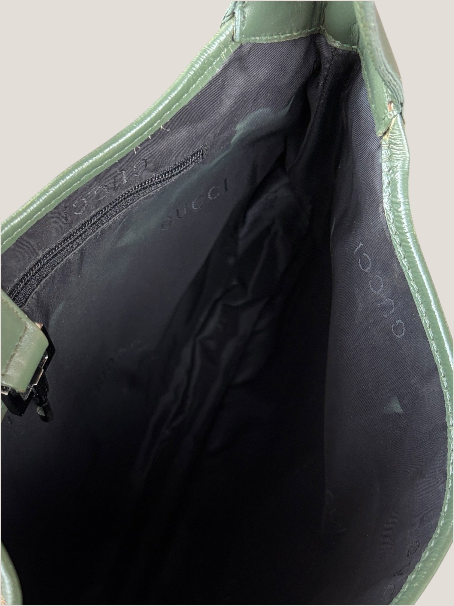 Gucci Jackie GG canvas con profili in pelle verde