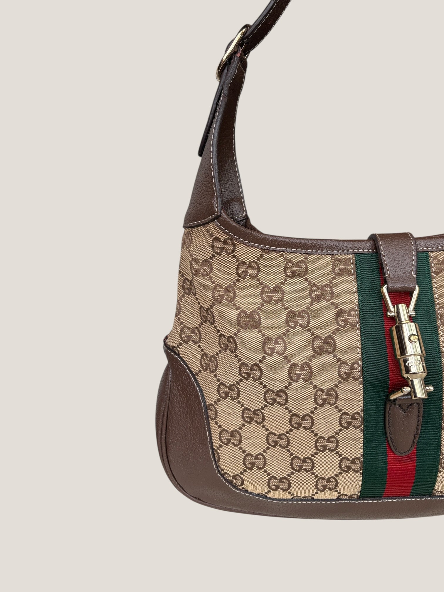 Gucci Jackie GG Canvas con dettaglio Piston