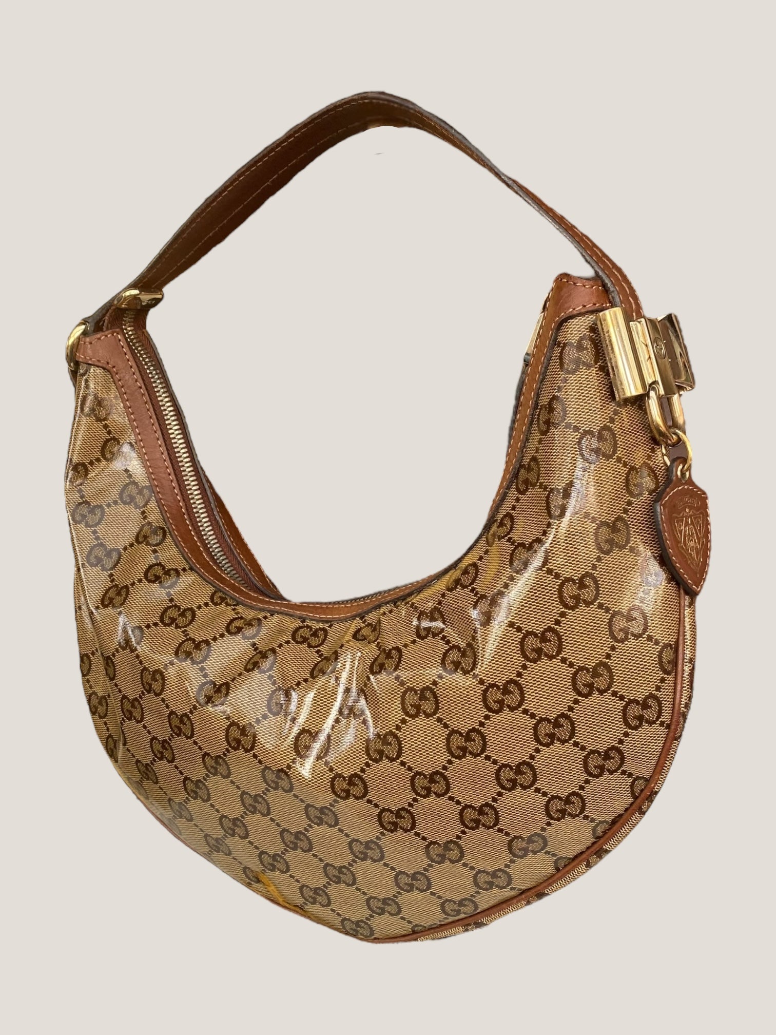 Gucci Hobo cristallo con fiocco dorato e charm