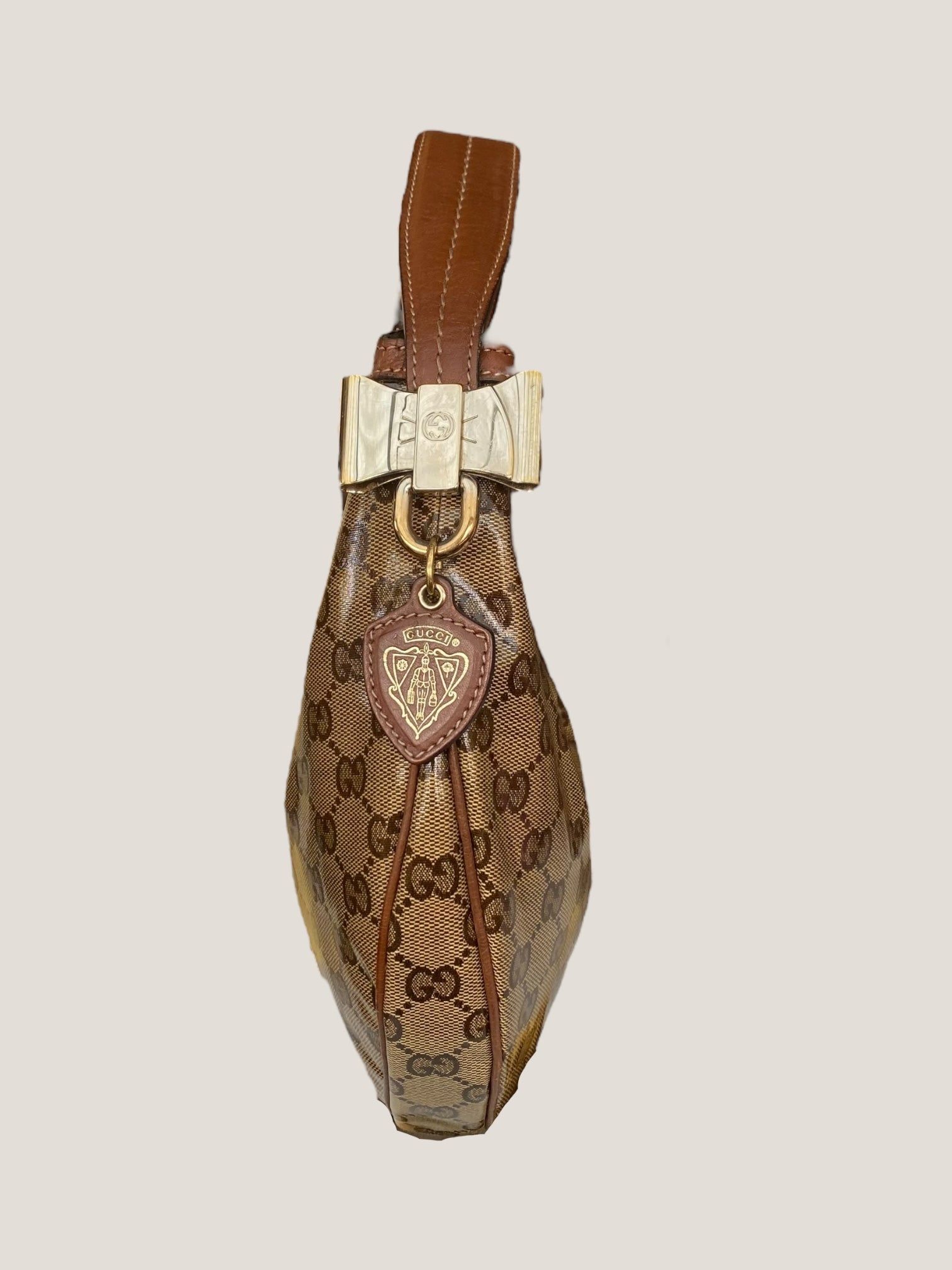 Gucci Hobo cristallo con fiocco dorato e charm