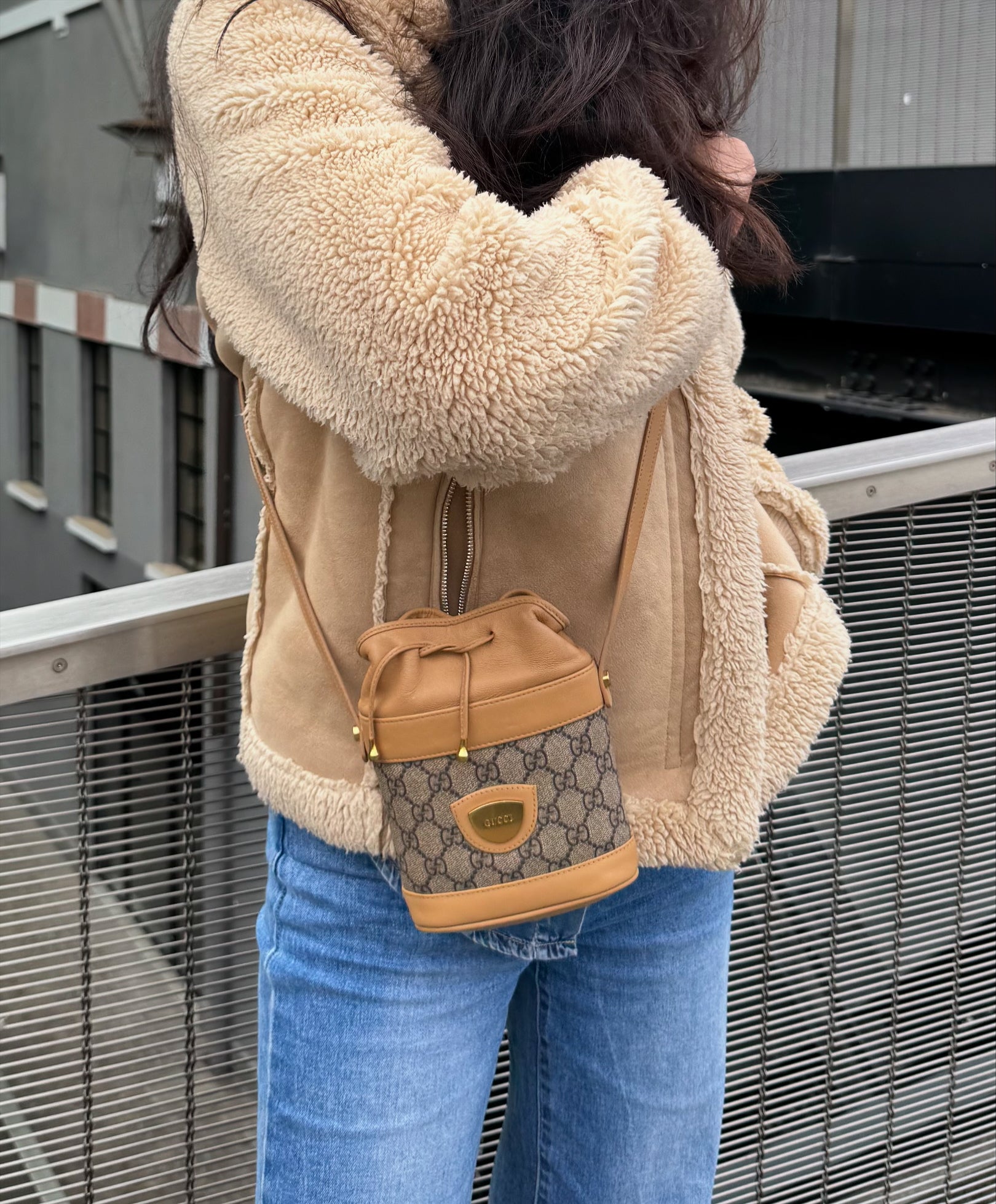 Gucci monogram mini drawstring