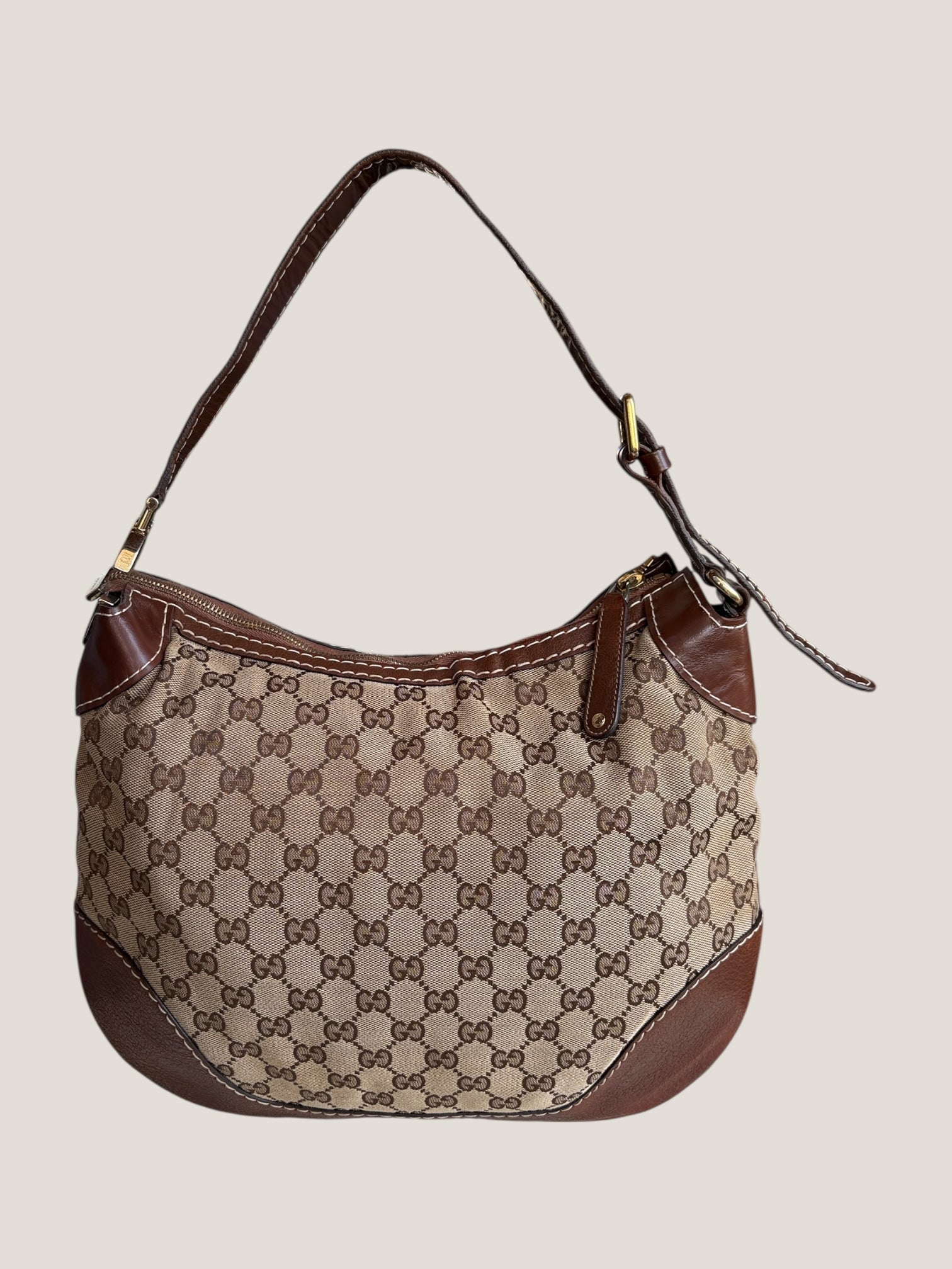 Gucci GG canvas hobo con logo G laterale