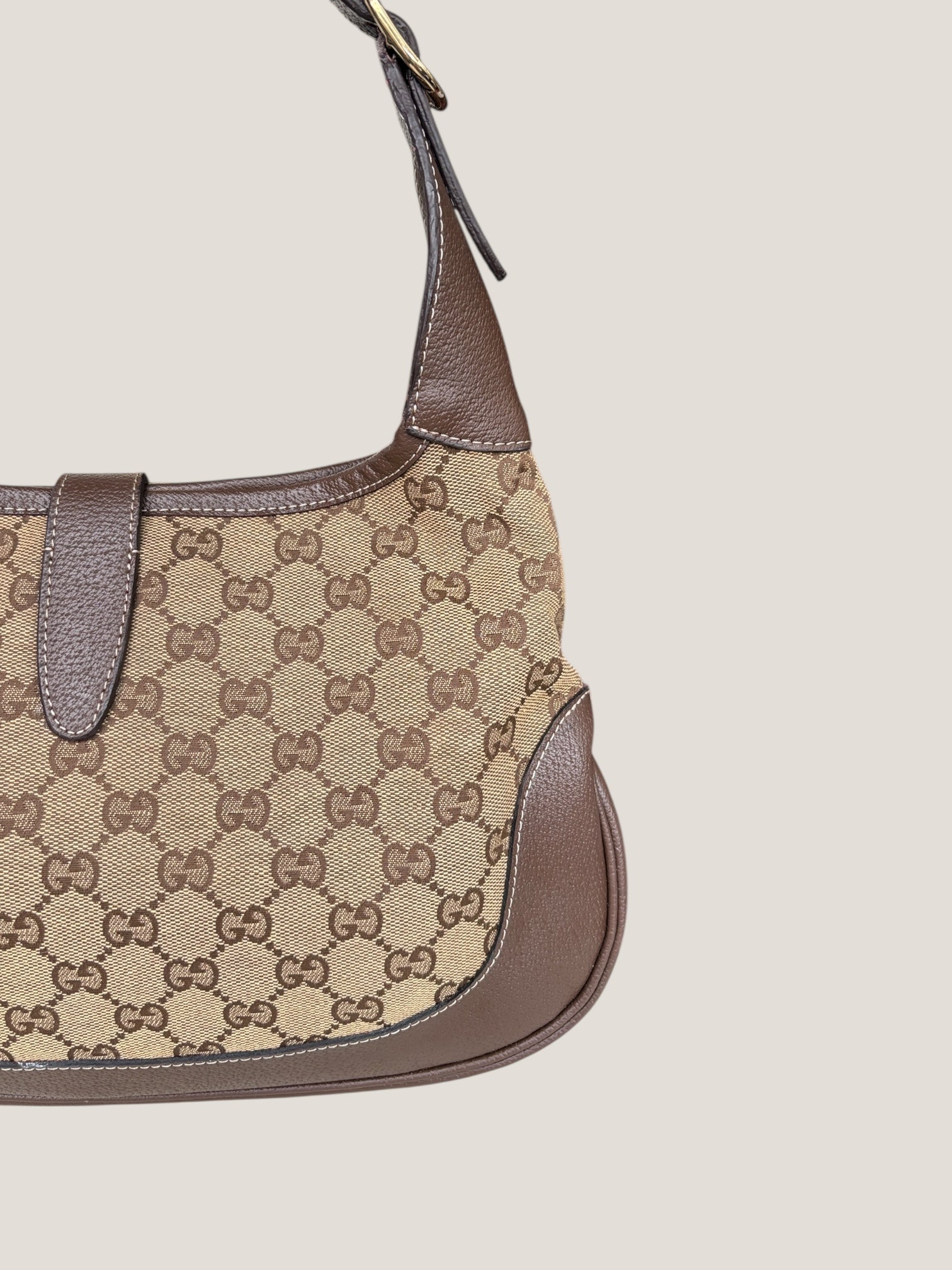 Gucci Jackie GG Canvas con dettaglio Piston
