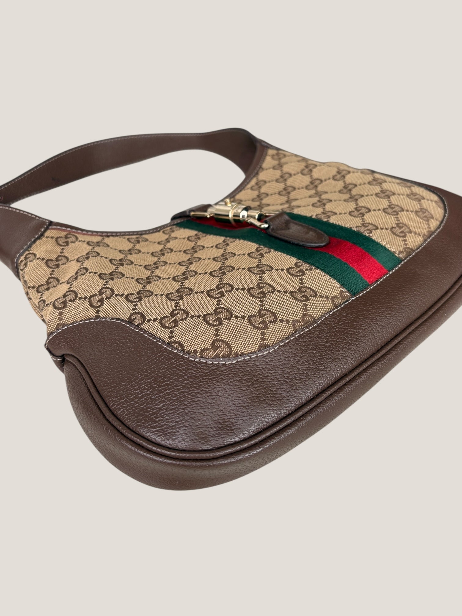Gucci Jackie GG Canvas con dettaglio Piston