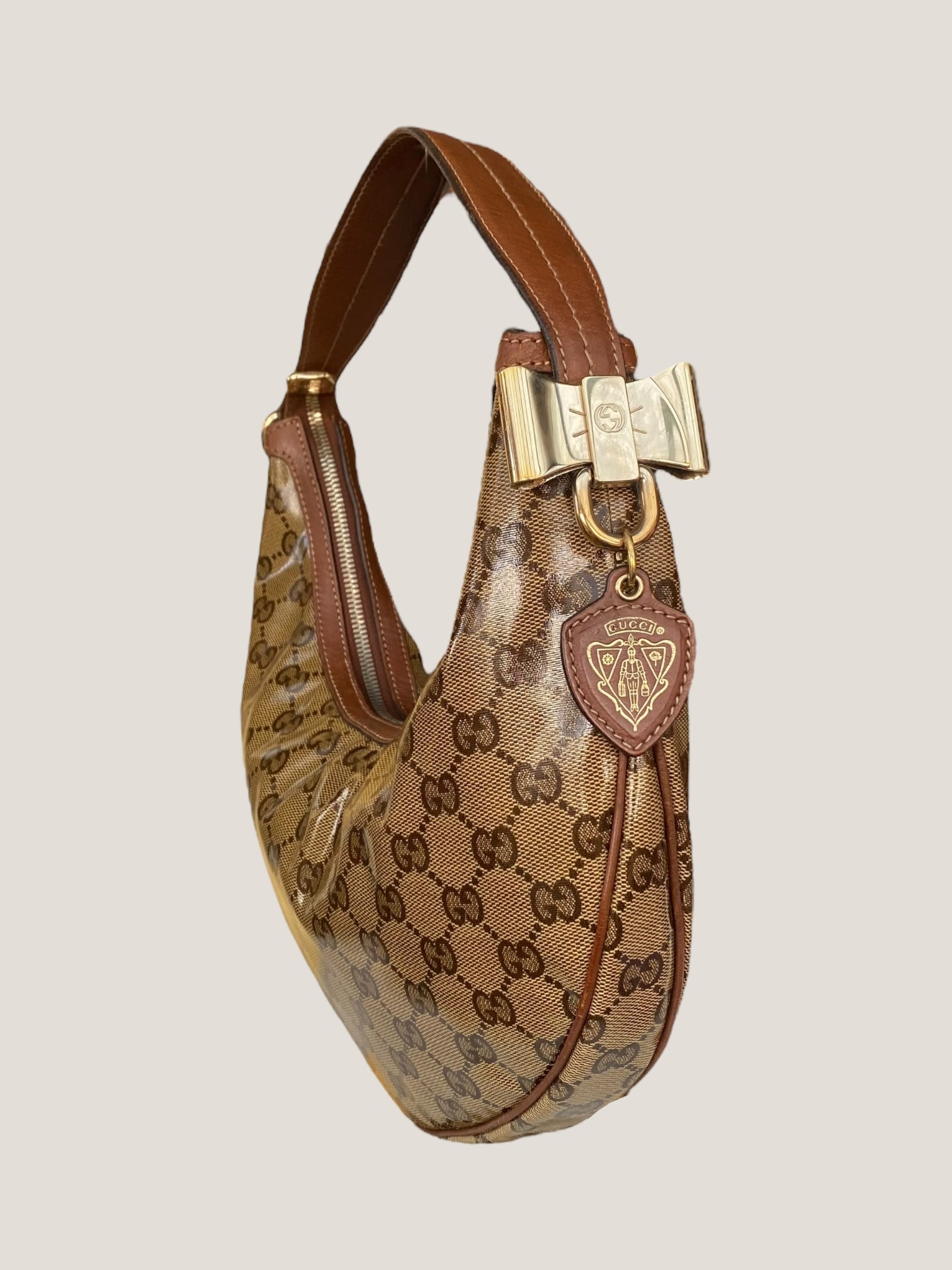 Gucci Hobo cristallo con fiocco dorato e charm