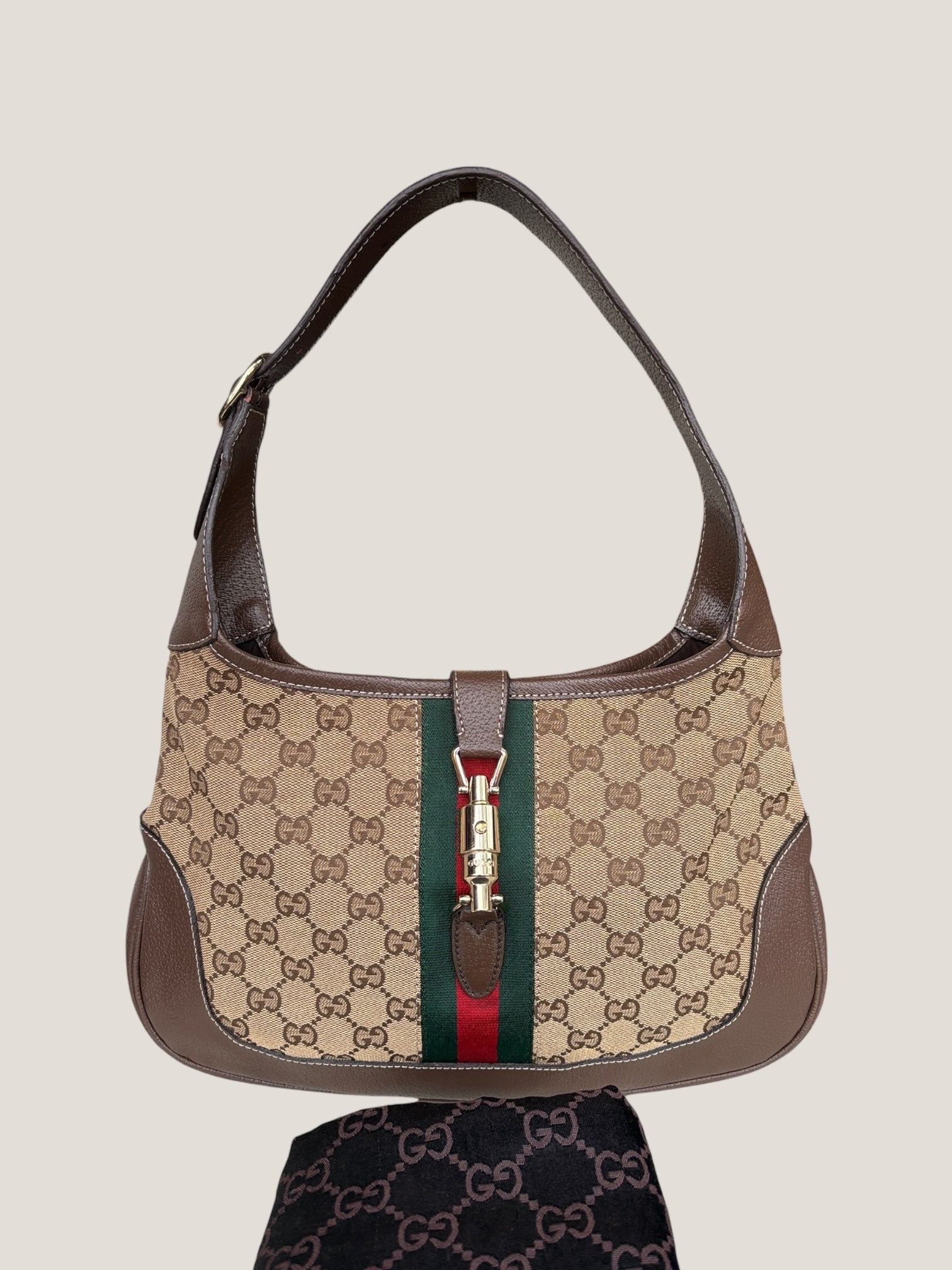 Gucci Jackie GG Canvas con dettaglio Piston
